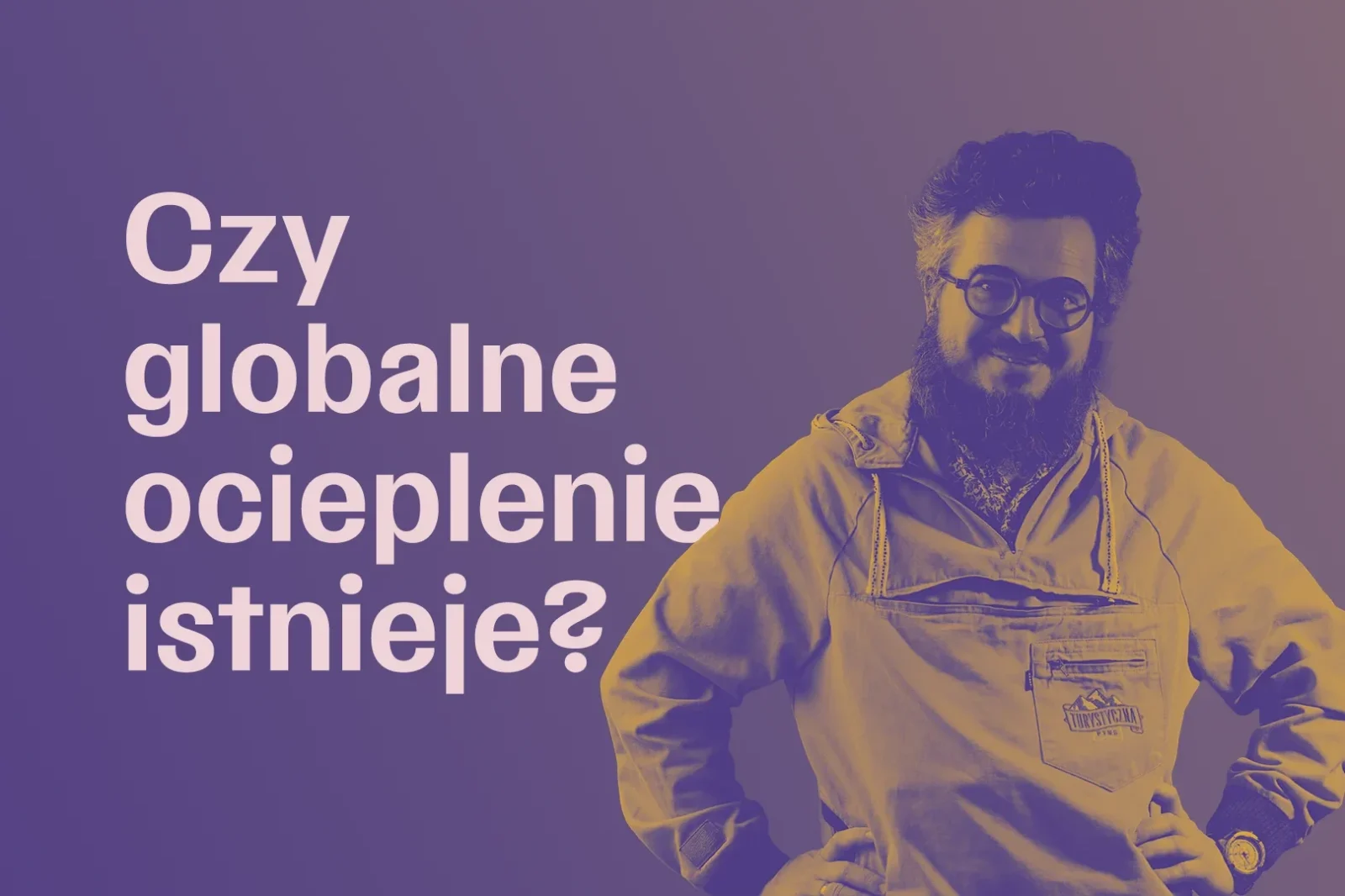 Mężczyzna w średnim wieku, w okularach, widoczny do pasa, w tle napis "Czy globalne ocieplenie istnieje?"
